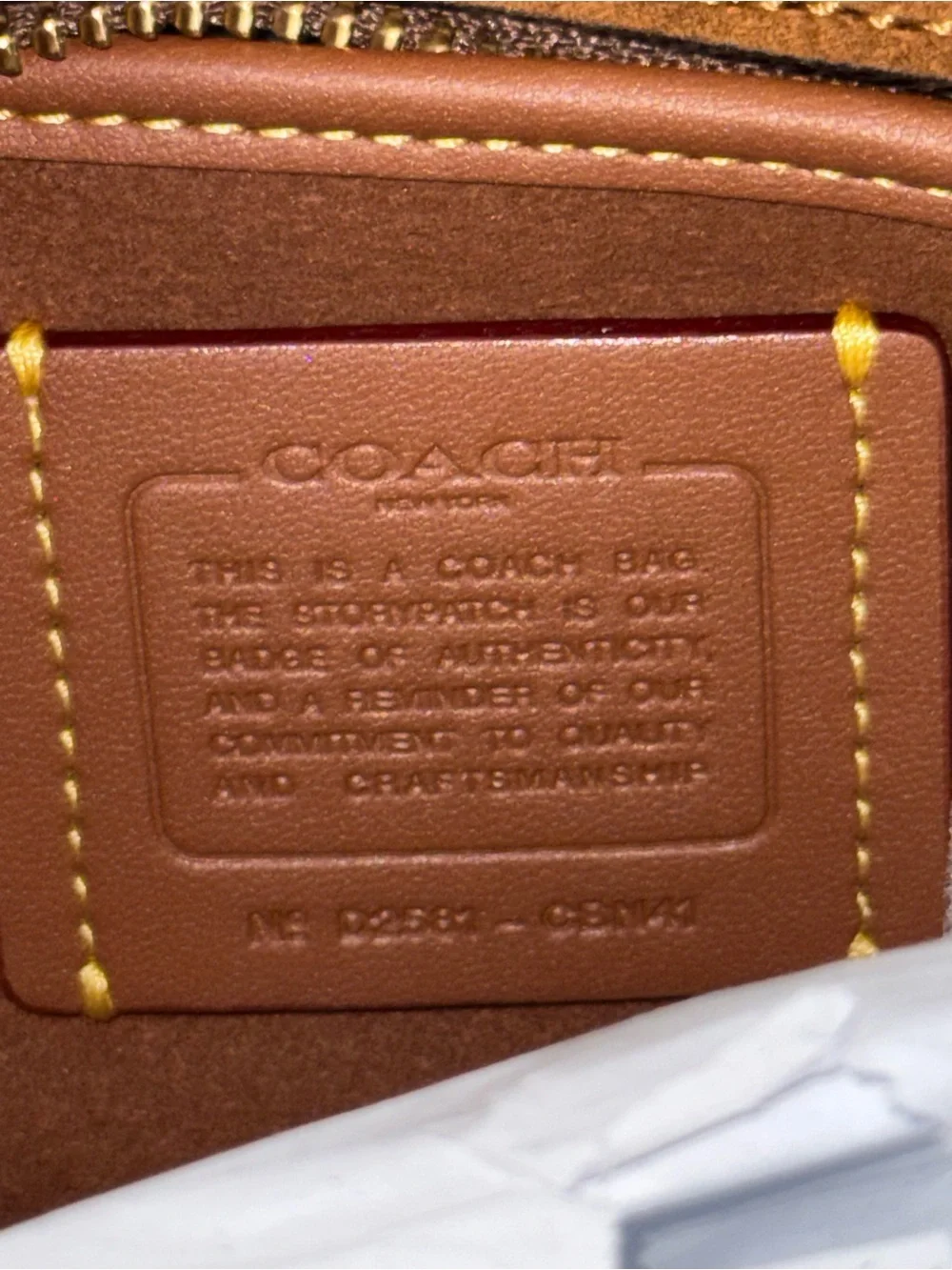Coach Empire 34 in Warm Brown